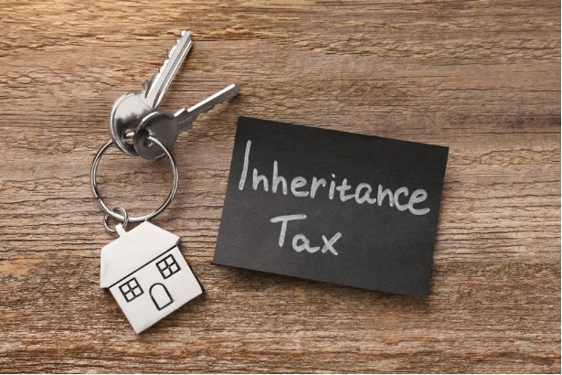 house keys with a sticky note saying "inheritance tax"