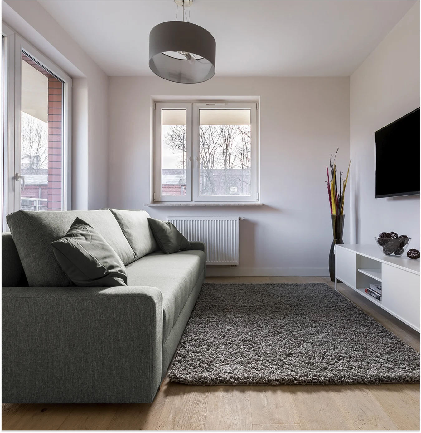 St Mary's Square apartment Apartment interior in St Mary's Square, Chesterfield with sofa rug and window