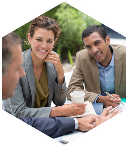 expats-buying-properties Two expats sitting outside at a property meeting
